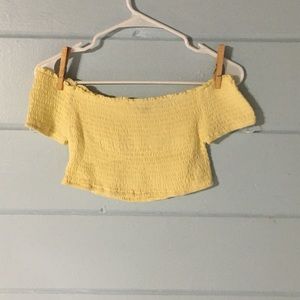 light yellow smocked off the shoulder crop top